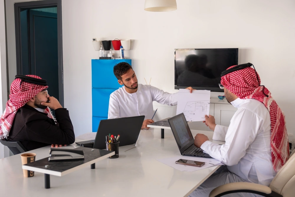 UAE Office Manager Employee discussing 