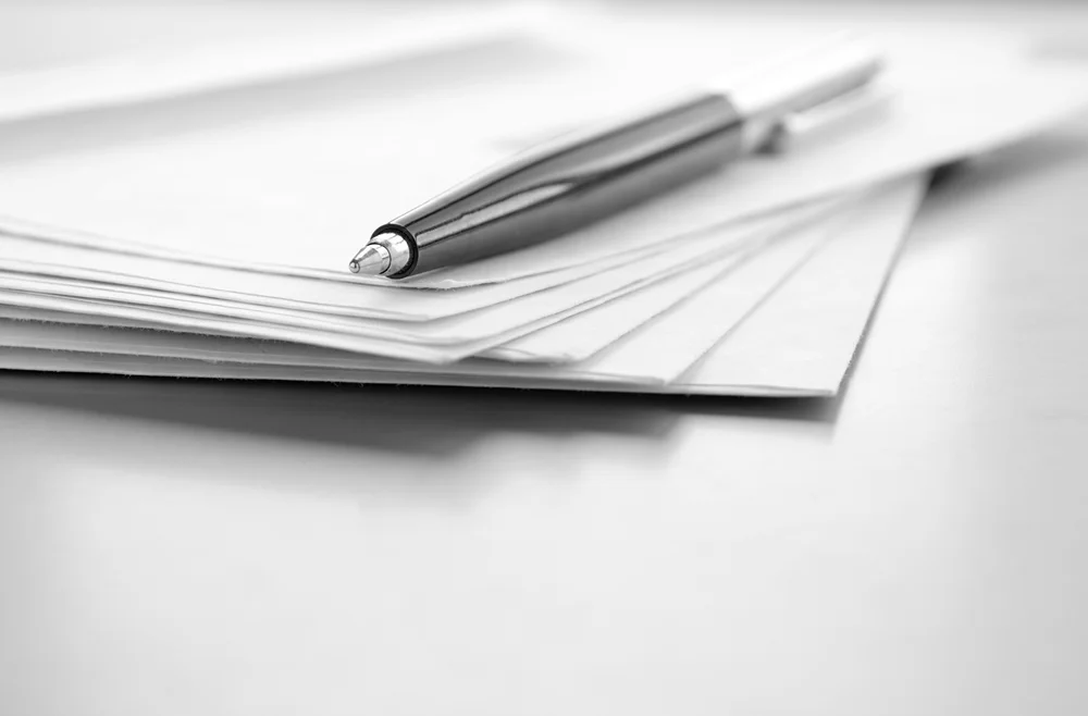 Business Documents with pen on top